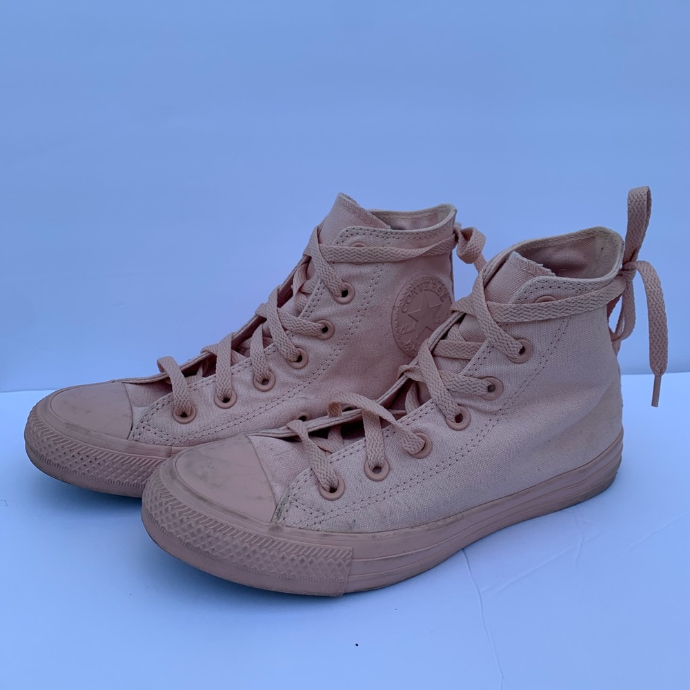Light pink converse high tops